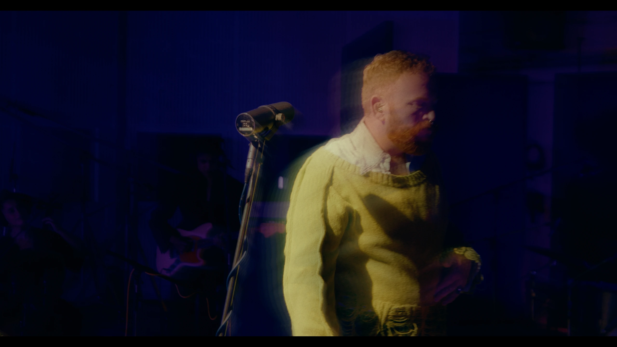 Street Violence — Tom Rasmussen, live performance directed by Joseph Wilson. Cinematography by Anibal Castaño, still 6